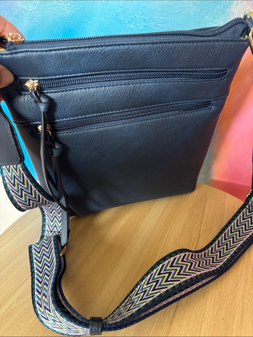 GEMIU navy  vegan leather crossbody bag featuring a wide, chevron strap